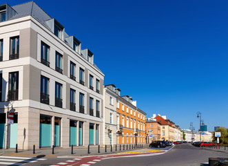 Panoramic view of Starowka Old Town quarter with new and renovated tenement houses along Podwale street in Warsaw, Poland © Art Media Factory