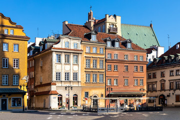 Fototapeta na wymiar Panoramic view of historic colorful tenement houses at Royal Castle Square - Plac Zamkowy - in Starowka Old Town quarter of Warsaw, Poland