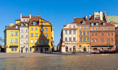 Panoramic view of historic colorful tenement houses at Royal Castle Square - Plac Zamkowy - in Starowka Old Town quarter of Warsaw, Poland © Art Media Factory