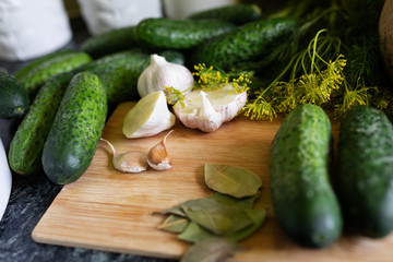 cucumbers on a wooden board