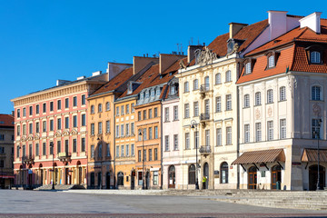 Fototapeta na wymiar Panoramic view of Krakowskie Przedmiescie street with historic tenement houses in Starowka Old Town quarter of Warsaw, Poland