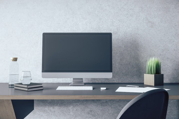 Stylish designer desktop with empty computer screen