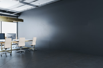 Minimalistic coworking office interior with empty gray wall