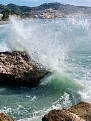 waves crashing on rocks