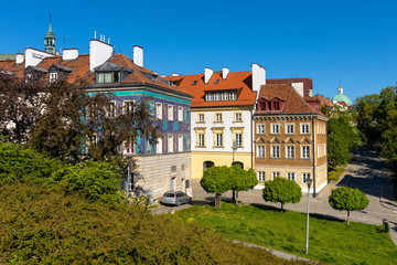 Panoramic view of historic, richly decorated colorful tenement houses at Bugaj, Mostowa and Brzozowa streets of Starowka Old Town quarter in Warsaw, Poland © Art Media Factory