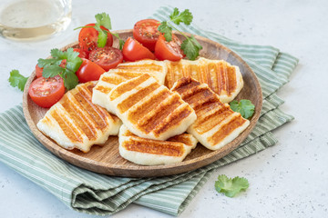 Grilled Halloumi Cheese and fresh tomato salad.