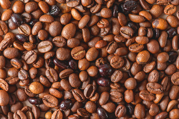 Coffee beans texture high quality background. Roasted coffee beans. Mixture of different kinds of roasted coffee beans background.