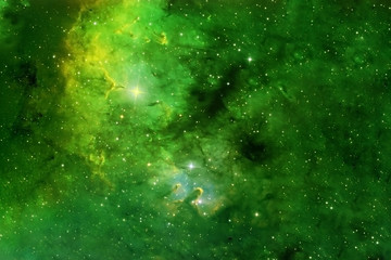 Beautiful space nebula of green color. Elements of this image were furnished by NASA. © Artsiom P
