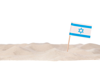 Israeli toothpick paper flag on white sand