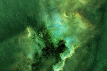 Beautiful space nebula of green color. Elements of this image were furnished by NASA.