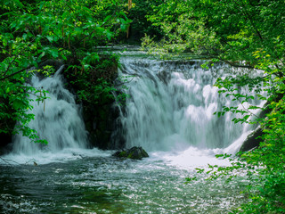 Fototapeta na wymiar spring waterfalls in the mountains in Bulgaria_1