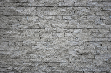 Old grey brick wall texture, abstract background