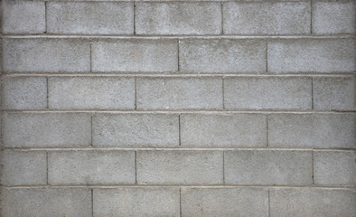 Fototapeta premium Old grey brick wall texture, abstract background