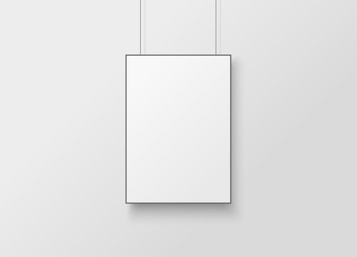 White poster with black frame mockup.  Empty white A4 sized paper hanging on gray wall