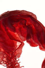 Background or texture of red amber, sieve, cotton cloth and drapery.