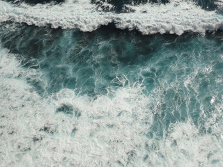 teal foaming sea water background