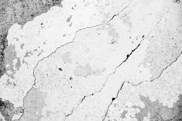 Texture of a concrete wall with cracks and scratches which can be used as a background