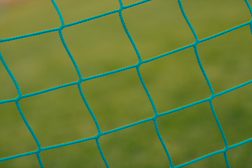 Detail photo of sports goal net. Net soccer field equipment