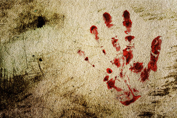 background with a print of a bloody hand © Sergii