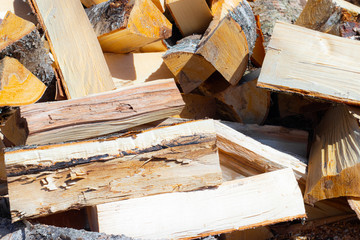 Background of firewood, article about chopping firewood, stove heating