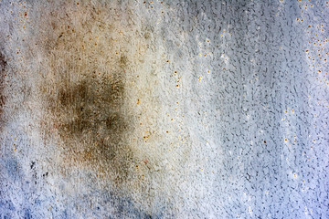 Metal texture with scratches and cracks which can be used as a background