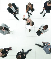 top view. group of serious diverse business people looking at the camera