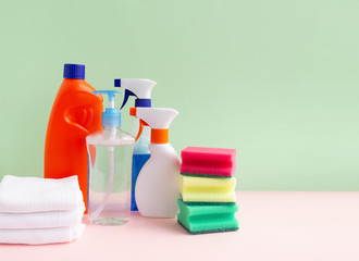 Cleaning supplies, on a homogeneous background with a place for inscription. The concept of cleaning.