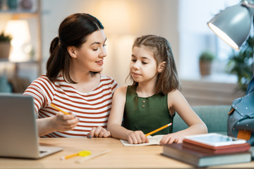 Girl doing homework or online education.