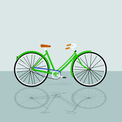 beautiful bike with green frame on a gray background
