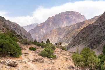 The beautiful view of blue sky and snow mountain summit near to Kaltsit peak in Fann mountains in Tajikistan