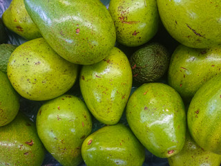 stacked avocados background
