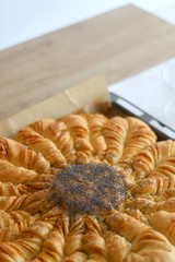 Homemade pull apart cheesy bread on a table. Selective focus.