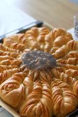 Homemade pull apart cheesy bread on a table. Selective focus.