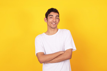 young male teenager isolated on color background