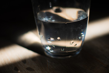 background photo A glass of water with light and shadow abstract beautiful vivid fresh thirsty