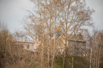 temple Church on the hill through the trees