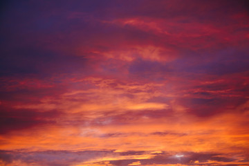 Naklejka na ściany i meble Dramatic sunset and sunrise sky. Sunset and sunrise orange and purple color sky background. Nature background