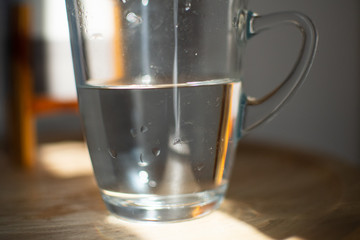 having a fresh wake up in the moring with a glass of water