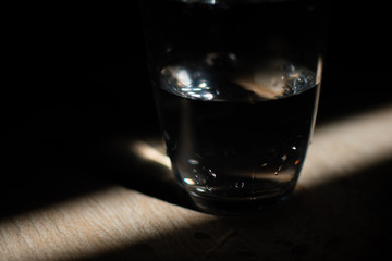 background photo A glass of water with light and shadow abstract beautiful vivid fresh thirsty