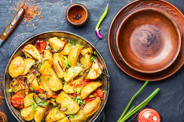 Roasted potato in a frying pan