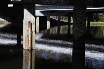 Concrete bridge columns with water level indicator