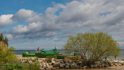 Fototapeta na wymiar Fishing boats at the beach in Gdynia.