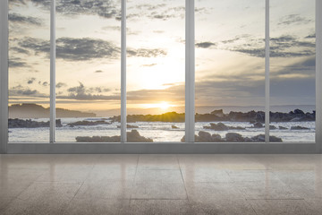 Empty room with ocean view and rocks
