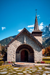 Fototapeta na wymiar Old stone Les Praz Church . Alps, France.