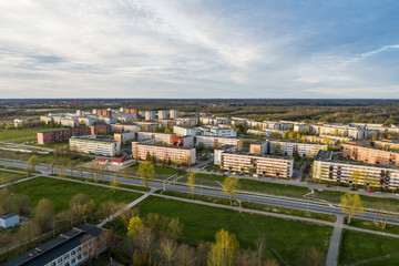 Aerial cityscape panoramic view of building construction near the hospital at sunset. 