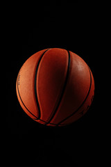 Basketball ball on a black background