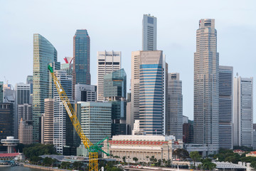 Plakat Picturesque panoramic view of Singapore city at day time. Financial and trading center hub in Asia region. Concept of success. Modern buildings in high-tech world.