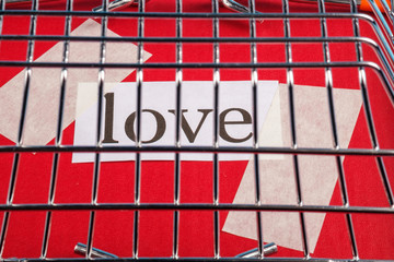 the inscription love is covered with a steel cage