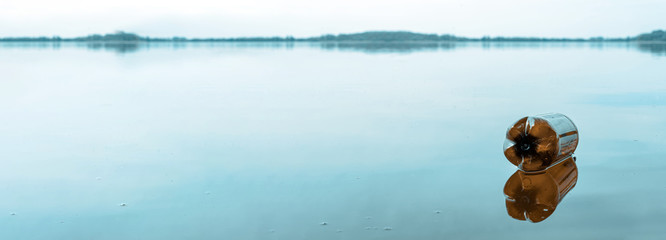 Environmental protection. Garbage trash in marine water beach. Plastic waste rubbish in sea, ocean and environment. Empty used dirty bottles. Ecological problem.