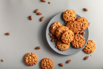 Biscuits on a plate top view. White background and copy space. Vkusnoe biscuits for Breakfast in the plate.